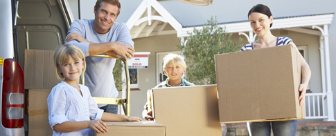 family-holding-boxes